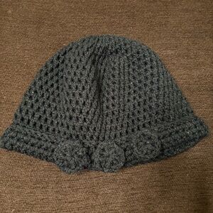 Crocheted Black beautiful beanie with three flowers